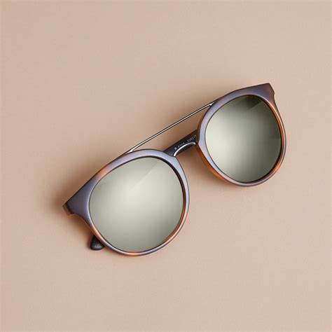 burberry logo scratch|Logo Bar Round Sunglasses in Dark havana .